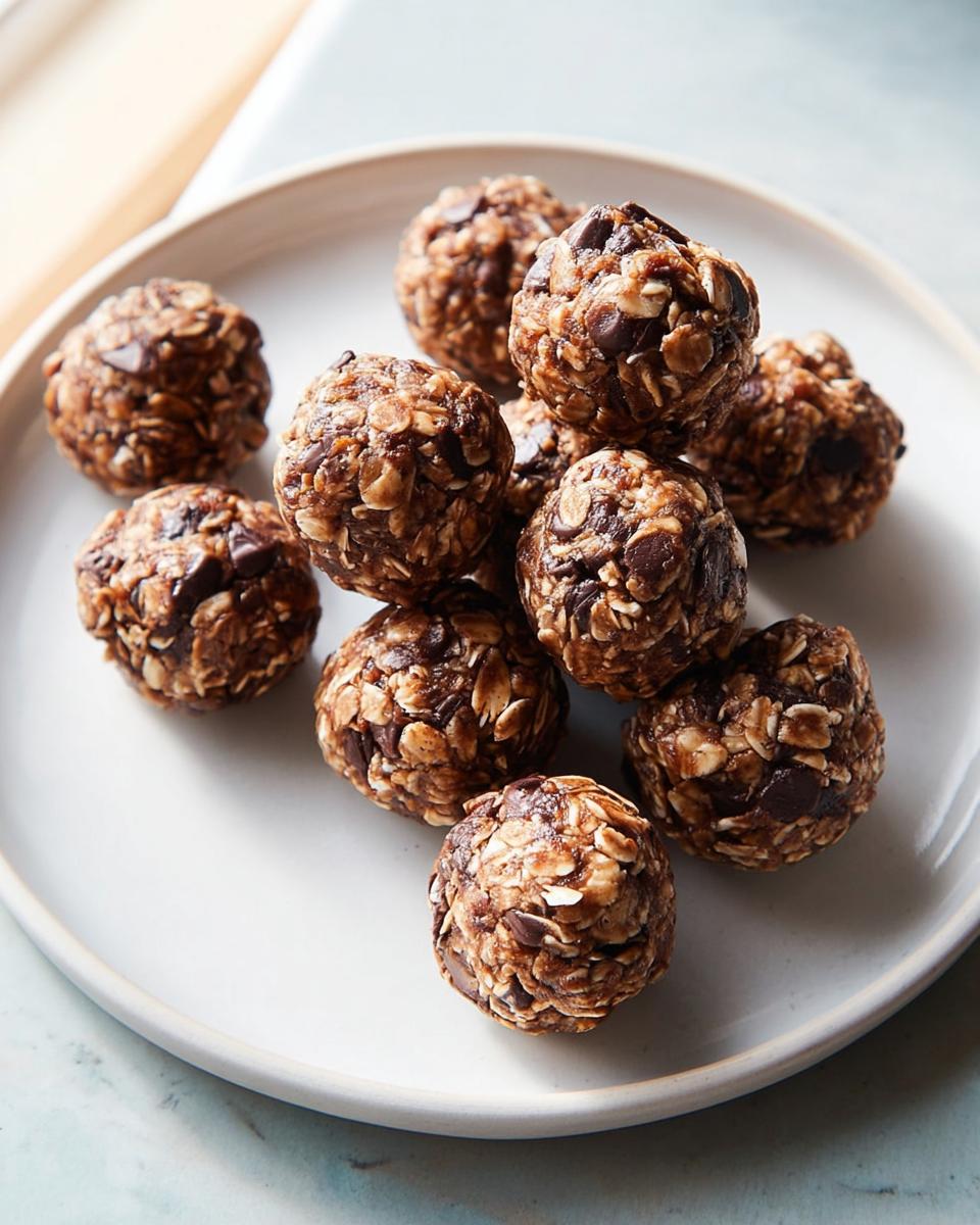 A pile of chocolate chip energy bites made with oats, perfect for quick breakfast ideas recipes.