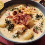A bowl of creamy soup featuring gnocchi, kale, shredded chicken, and bacon bits, part of The Only Soup Recipes Recipe.