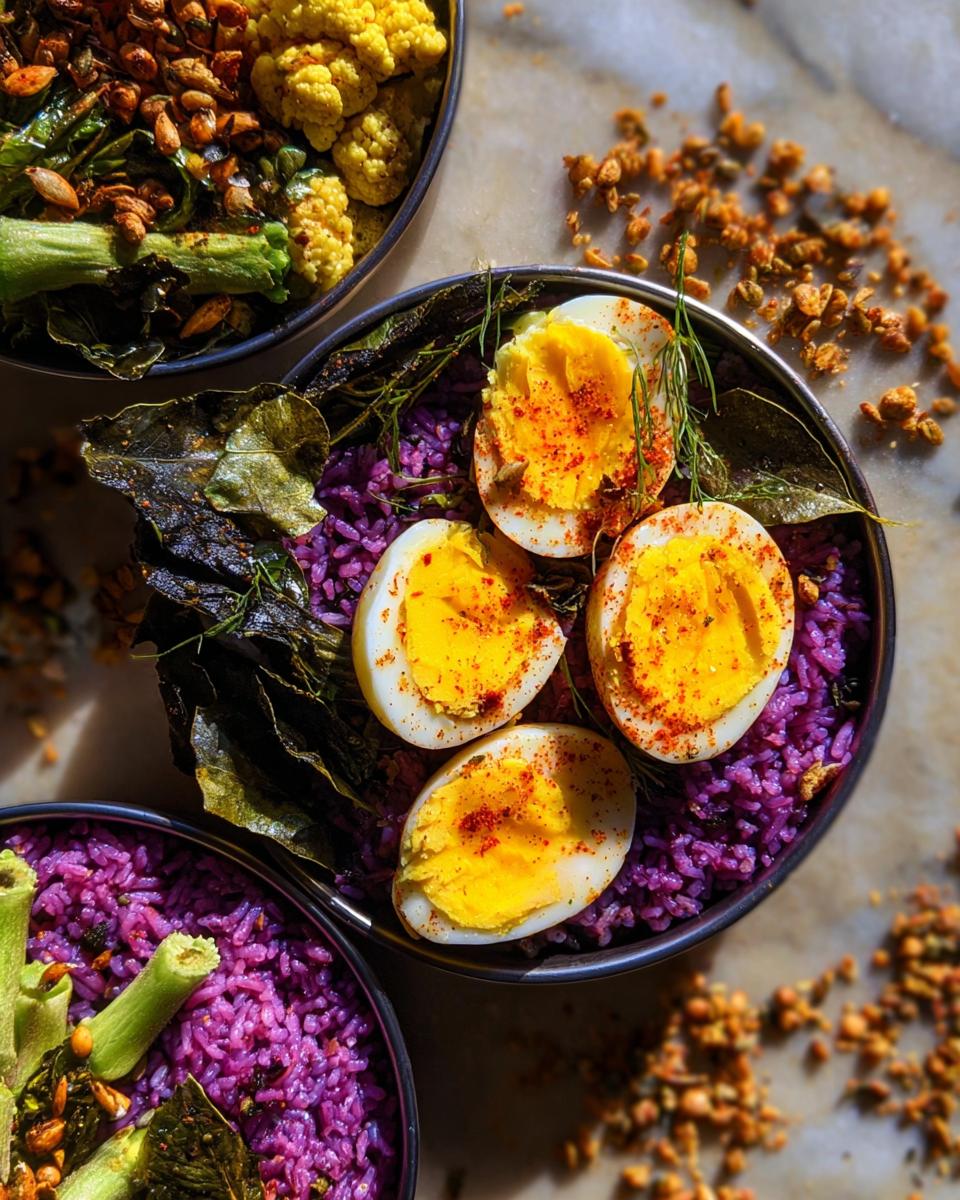 Four halves of hard-boiled eggs sprinkled with paprika served over purple rice, part of The Ultimate Egg Recipes Guide for Beginners.