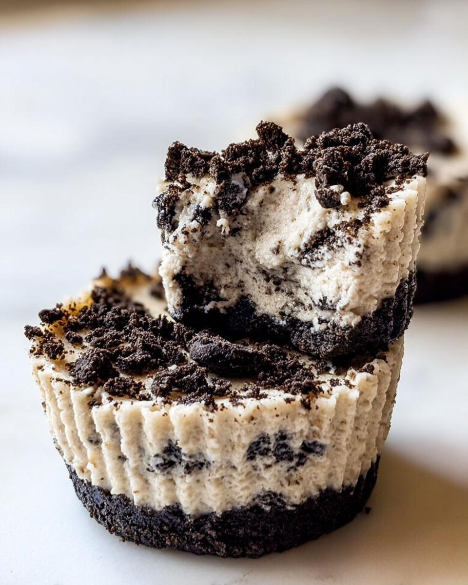 Close-up of Healthy No-Bake Oreo Cheesecake Bites, showing the creamy filling and crumbled Oreo topping.
